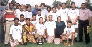 The Delhi Audit Football team,who beat Northern Railway 3-1 to emerge the DSA Institutional League Champions, with the trophy