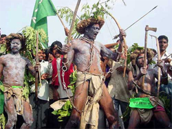 Tribals in their traditional costume celebrate the 18th Foundation Day of All Jharkhand Students Union