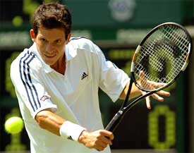 Britain's Tim Henman returns to Tomas Zib of the Czech Republic