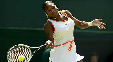 Top seed Serena Williams of the US plays a return to compatriot Jill Craybas