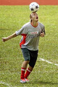 England captain David Beckham shows his skills at a stadium in Ho Chi Minh, Vietnam