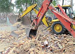 JBCs demolish illegal structures at Palsora village in Chandigarh on Thursday