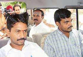 B. Raju and his accomplices are taken away by the police in SAS Nagar 