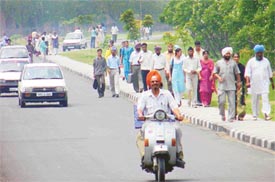 Candidates head for examination centres to take the Combined Entrance Test