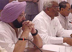 Punjab Chief Minister Amarinder Singh, Union Minister for Rural Development Kanshi Ram Rana and MP Chief Minister Digvijay Singh at a meeting of empowered sub-committee of the NDC on financial and administrative empowerment of Panchayati Raj institutions