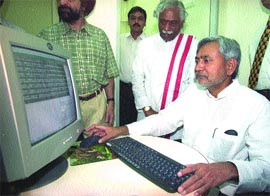 Union Railway Minister Nitish Kumar at the cyber cafe which was inaugurated on platform no. 12 of New Delhi railway station in the Capital on Friday