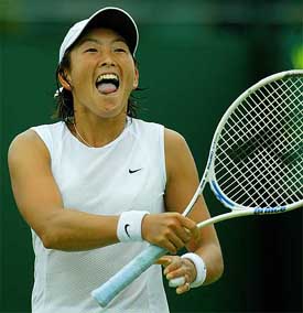 Japan's Ai Sugiyama celebrates her victory over Nathalie Dechy of France