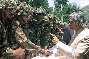 President A.P.J. Abdul Kalam shakes the hand of a soldier