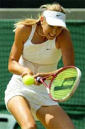 Russia's Maria Sharapova returns to Yugoslavia's Jelena Dokic