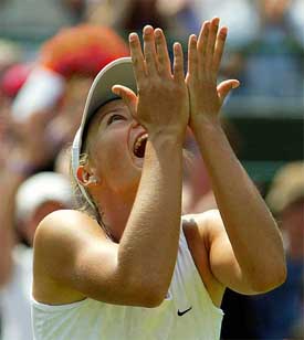 Russia's Maria Sharapova blows a kiss to the crowd