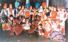 Members of the Ludhiana bhangra team with folk artistes of other countries on the opening day of the International Festival of Folk Arts and Folk Crafts