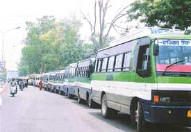 Local bus operators lined up their buses in front of Mini Secretariat before proceeding to meet the Deputy Commissioner