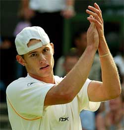 Andy Roddick of the US celebrates his victory over Thailand's Paradorn Srichaphan