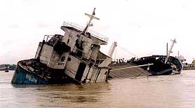 A river-coaster capsizes into the flooded Karnaphuli river at Chittagong, 216 km south-east of Dhaka