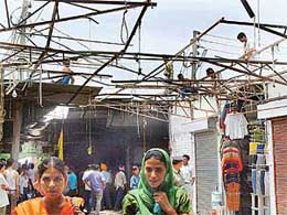 Unauthorised tin sheds being removed in Sector 19 Sadar Bazaar, Chandigarh