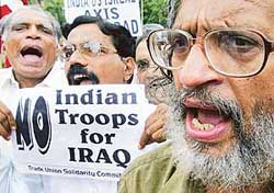 CPM activists raise slogans against the proposal to send Indian troops to Iraq on US request
