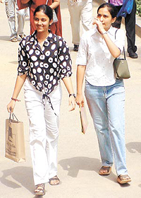 Students stroll into Hindu College to vet the second cut-off list released by the Delhi University.
