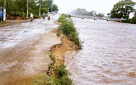 The eroded metalled road on the bank of the Bathinda branch of the Sirhind canal circle in Ghwaddi village on Wednesday. 