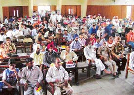 Students and their parents in the waiting hall during the admissions