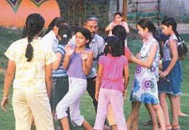 Balram motivates students at a theatre workshop