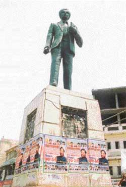 Posters of a rally by Mr Ram Vilas Paswan, pasted on the statue of Kartar Singh Sarabha