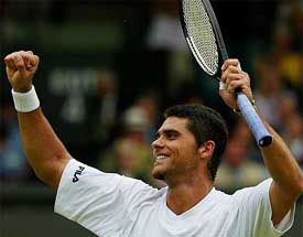 Australia's Mark Philippoussis celebrates victory over Sebastien Grosjean of France