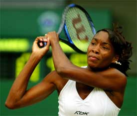 Venus Williams of the US returns to Belgium's Kim Clijsters