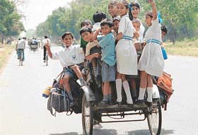 Children have fun on their way to school