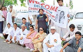 Congress workers wait at Chandigarh Airport to welcome Ms Sonia Gandhi who was on her way to Shimla to attend the Vichar Manthan conference