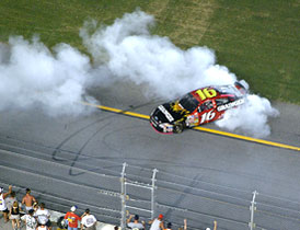 Rookie driver Greg Biffle of Washington celebrates his victory at the Pepsi 400 NASCAR Race