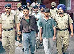 Three burglars, who were arrested by residents while committing a burglary