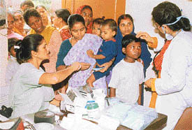 Doctors attend to patients suffering from gastroenteritis in Ludhiana