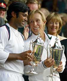 Martina Navratilova  of the USA and Leander Paes of India hold their trophies