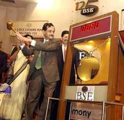 Maruti Udyog Ltd Managing Director Jagdish Khattar strikes the gong at the Bombay Stock Exchange