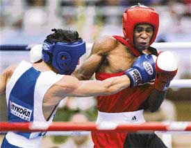 Mario Kindelan Mesa of Cuba and Boris Georgiev of Bulgaria exchange blows during the 60 kgm quarterfinals of the XII Senior World Boxing Championships