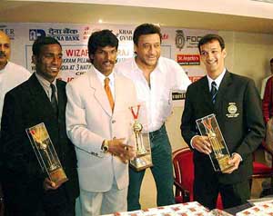 Members of the Indian hockey team, Vikram Pillay, Dhanraj Pillay and Viren Rasquinha