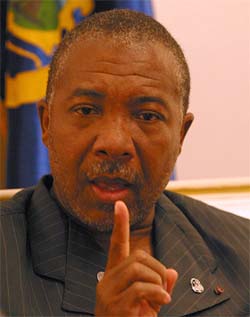 Liberian President Charles Taylor talks to a Reuters correspondent during an exclusive interview at the Executive Mansion in Monrovia 