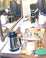 Empty soda and whisky bottles in a room in Mountview Hotel