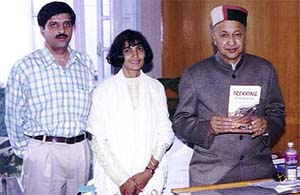 Chief Minister Virbhadra Singh releases the book "A Guide to Trekking in Himachal"