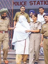 Sector 3 policemen take Dr Swapna Singh, accused of murdering her husband Sapra in Hotel Mountview on Friday