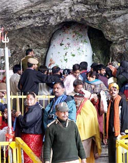Pilgrims jostle to offer prayers at the cave shrine in Amarnath