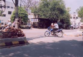 The divider on the Dandi Swami road closed by the MC has again been broken in front of a sweets shop to facilitate access to it
