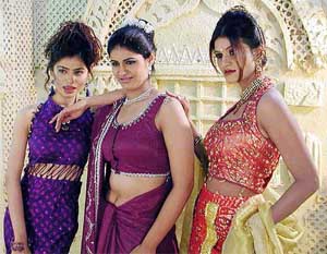 Models display dresses