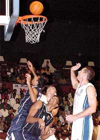 Indian and Uzbekistan players engaged in a tussle during their last round-robin league match