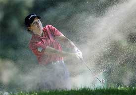 California's Juli Inkster blasts out the bunker 