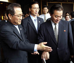 South Korean Unification Minister Jeong Se-hyun along with his North Korean counterpart Kim Ryung-sung in Seoul 