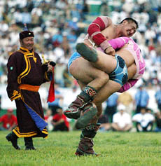 Wrestlers battle during the Naadam Festival in Ulan Bator