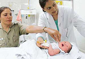 A one-day-old male child abandoned in Sector 41 being nursed at the Sector 16 General Hospital. 