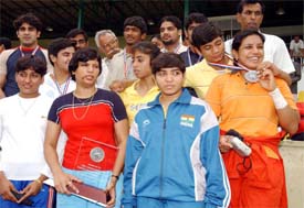 The Indian women's wrestling team, who triumphed at the Commonwealth Wrestling championship in Canada recently, at a felicitation function 