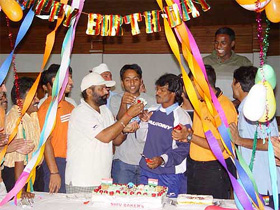 Indian hockey captain Dhanraj Pillay (C) celebrates his 35th birthday with team-mates 